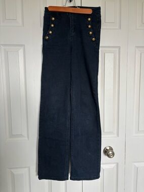 High-Rise Black Wide-Leg Jeans with Decorative Brass Buttons